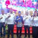 Bupati Murung Raya Heriyus dan Wakil Ketua DPRD Mura Dina Maulidah mengikuti Rakor Pembentukan Koperasi Merah Putih di Aula Jayang Tingang, Kamis (22/5/2025). (Dok. Pemprov Kalteng)