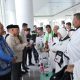 Bupati Kotabaru Muhammad Rusli memberikan sambutan saat melepas 178 calon haji Kloter 11 di Bandara Syamsuddin Noor, Banjarmasin, Minggu (25/5/2025).