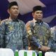 Pj. Sekda Kotabaru Eka Saprudin bersama kafilah saat menghadiri pembukaan MTQN ke-36 Provinsi Kalimantan Selatan di Martapura, Sabtu (21/6/2025).