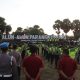 Kapolres Bantul AKBP Novita Eka Sari memimpin apel pengamanan malam 1 Suro di Alun-alun Parangkusumo, Kamis (26/6/2025), didampingi jajaran Forkopimda dan personel gabungan.