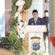 Bupati Andi Rudi Latif memberikan sambutan saat menghadiri syukuran Hari Bhayangkara ke-79 bersama Kapolres AKBP Arief Prasetya di Mapolres Tanah Bumbu, Selasa (1/7/2025).