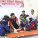 Bupati Pulang Pisau H. Ahmad Rifa’i memberikan arahan kepada peserta Palang Merah Remaja (PMR) Desa Sidodadi, Minggu (20/7/2025).