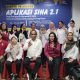 Kepala Dinas Kesehatan Pulang Pisau, dr. Pande Putu Gina, membuka Bimtek Aplikasi SIHA 2.1 di Palangka Raya, didampingi narasumber dan peserta dari Puskesmas dan Dinkes setempat.