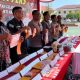 Kapolresta Banjarmasin Kombes Pol Cuncun Kurniadi memimpin pemusnahan sabu, ekstasi, dan ganja hasil pengungkapan 37 kasus narkotika, Kamis (24/7/2025). (Foto: Humas Polresta Banjarmasin)