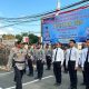 Kapolres Kotabaru AKBP Doli M. Tanjung memimpin apel gelar pasukan Operasi Patuh Intan 2025 di halaman Mapolres Kotabaru, Senin (14/7/2025).