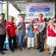 Area Manager Communication, Relation & CSR Pertamina Patra Niaga Regional Sumbagsel, Rusminto Wahyudi, menyerahkan secara simbolis bantuan kebutuhan pokok kepada perwakilan warga korban kebakaran di RT 13 Kelurahan 1 Ulu, Palembang, Jumat (25/7/2025).