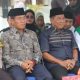 Bupati Heriyus didampingi Wakil Bupati Rahmanto Muhidin dan Ketua DPRD Rumiadi menyapa peserta pawai 1 Muharram 1447 H di Kota Puruk Cahu, Minggu (20/7/2025).
