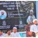 Anggota DPRD Tanah Bumbu dari Fraksi PAN, Makhruri (berdiri kiri), saat memberikan sambutan dalam acara Tabligh Akbar memperingati Hari Ulang Tahun Desa Gunung Raya ke-16, Kecamatan Mantewe, Sabtu (9/8/2025). Acara tersebut menghadirkan ulama asal Yaman, Syekh Ahmad Bin Selm