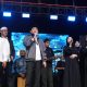Bupati Tanah Bumbu Andi Rudi Latif bersama musisi dan Wakil DPRD tampil dalam Aksi Tanah Bumbu Bershalawat di Jalan Kodeco KM 2, Simpang Empat, Sabtu malam (9/8/2025).