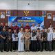 Kepala BNNK Hulu Sungai Selatan Agus Winarti, MPH, memaparkan strategi P4GN dalam Rapat Koordinasi Tahap II di Aula Kecamatan Kandangan, Rabu (13/8/2025).