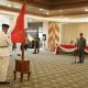 Wakil Bupati Kotabaru Syairi Mukhlis mengukuhkan anggota Paskibraka 2025 di Aula Bamega, Jumat (15/8/2025) pagi.