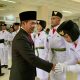 Bupati Pulang Pisau H. Ahmad Rifa’i mengukuhkan Anggota Paskibraka 2025 di Aula Banama Tingang, Jumat (15/8/2025).
