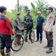 Tim gabungan Polsek Kelumpang Hulu, TNI, Manggala Agni, dan warga berpatroli mencegah Karhutla di Desa Karang Liwar, Sabtu (16/8/2025).