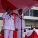Bupati Kotabaru H. Muhammad Rusli memimpin upacara peringatan HUT ke-80 Proklamasi Kemerdekaan RI di halaman Kantor Bupati, Minggu (17/8/2025).