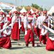 Pelajar SD di Tanah Bumbu tampil penuh semangat dalam Lomba Gerak Jalan HUT RI ke-80 di Kecamatan Simpang Empat, Kamis, (14/8/2025)
