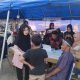 Suasana Aksi Sinergitas Merah Putih di Pantai Pagatan. Berbagai SKPD memberikan pelayanan secara langsung kepada ratusan warga.