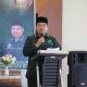 Ketua ISNU Tanah Bumbu, Muhammad Akram Sadli, menyampaikan pidato dalam Rakercab ISNU Tanah Bumbu 2025 di Tanah Bumbu, Minggu (31/8/2025). Ia menegaskan pentingnya pemerataan pembangunan di Kalimantan Selatan.