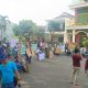 Puluhan warga Perumahan Puri Cempaka Putih II RW 6, Kelurahan Bumiayu, Kecamatan Kedungkandang, Kota Malang, saat menggelar demo menuntut pengembang PT Multi Graha Kencana Asri segera menyerahkan PSU kepada Pemkot Malang, Sabtu (20/9/2025) pagi.