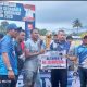 Bupati Kotabaru H. Muhammad Rusli menyerahkan trofi kepada kapten Surya Samudra FC usai menjuarai Bupati Cup 2025 di Stadion Bamega.