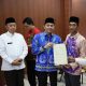 Bupati Tanah Bumbu Andi Rudi Latif bersama Kakanwil BPN Kalsel Abdul Aziz berpose usai penandatanganan peresmian layanan inovatif di Kantor Pertanahan Tanah Bumbu, Kamis (11/9/2025).