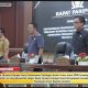 Sekda Tanah Laut Ismail Fahmi menyampaikan jawaban Bupati atas pandangan umum fraksi-fraksi DPRD dalam Rapat Paripurna pembahasan Raperda APBD 2026.
