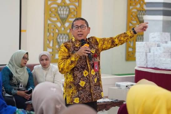 Penjabat Sekda Banjar H. Ikhwansyah saat membuka kegiatan pembekalan pra pensiun ASN di Martapura.