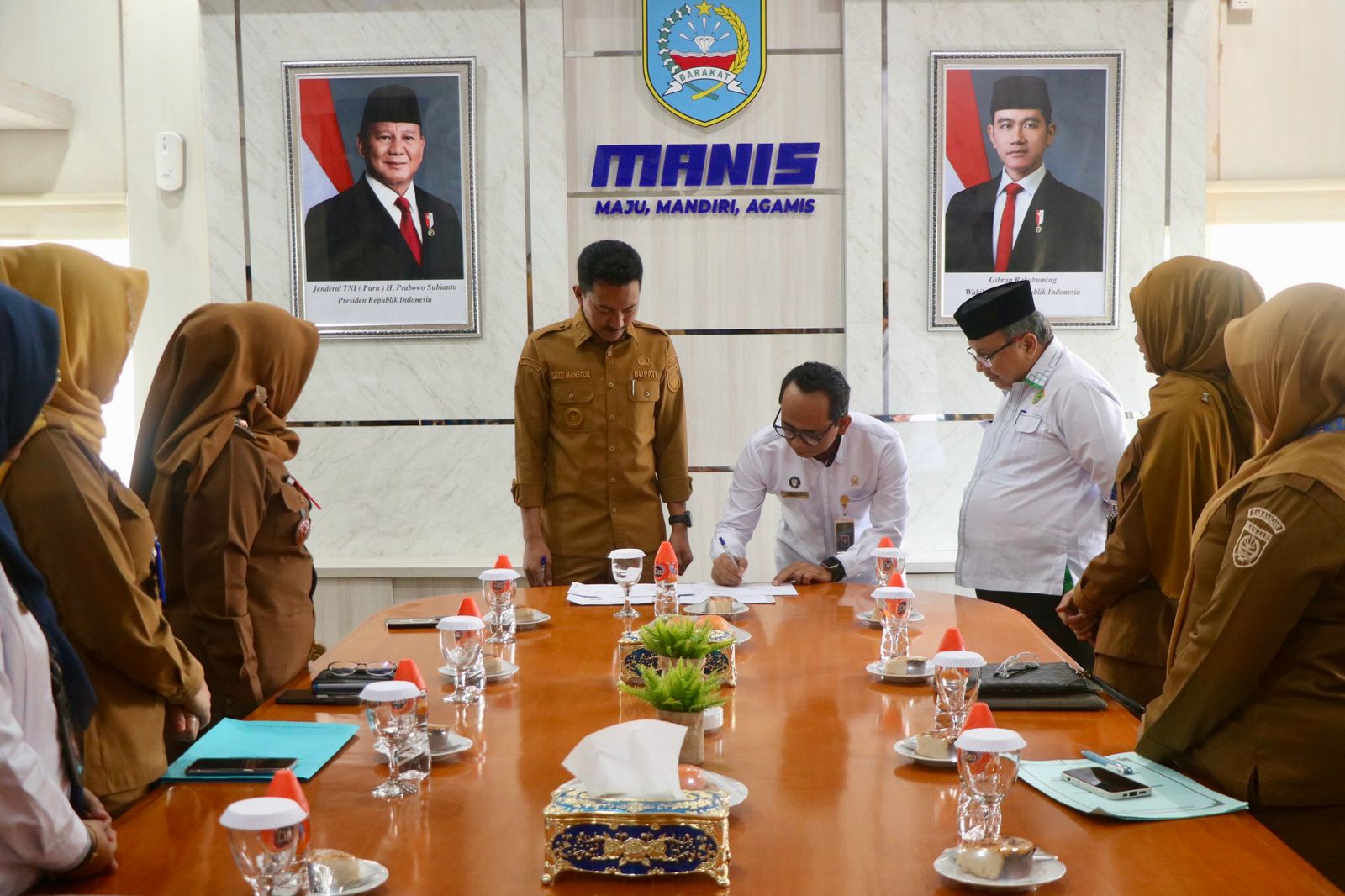 Penandatanganan nota kesepakatan antara Pemkab Banjar, Pengadilan Agama Martapura, dan Kementerian Agama tentang pencegahan perkawinan usia dini