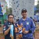 H. Rilly Syasfar dan Gt. Ersandi berdiri di area panjat tebing RTH Kijang Mas Pelaihari saat penutupan Cabor Panjat Tebing Porprov Kalsel XII.