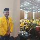 H. Agus Prasetya berdiri di depan backdrop Musda Golkar Tanah Laut, berbicara kepada wartawan setelah resmi terpilih sebagai ketua.