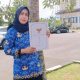 Pegawai Pemkab Sumedang memegang dan memperlihatkan SK pengangkatan ASN Paruh Waktu usai upacara HUT Ke-54 Korpri.