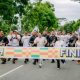 H Andi Syamsuddin Arsyad atau H Isam mengikuti jalan sehat Batfest 2025 bersama tiga puluh ribu peserta di Batulicin Tanah Bumbu.