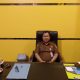Kepala DKPP Kotabaru Sarwani duduk di ruang kerja mengenakan seragam dinas cokelat, membahas program pertanian dan ketahanan pangan daerah.