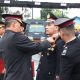 Upacara penganugerahan Satyalancana Pengabdian kepada personel Polres Tanah Laut di Kalimantan Selatan