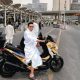 Daeng Anshar berpose dengan motor Yamaha XMAX dalam perjalanan darat menuju Arab Saudi untuk menunaikan ibadah umrah.
