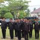 Upacara tabur bunga Polres Tanah Bumbu di Taman Makam Pahlawan pada peringatan Hari Pahlawan 2026.
