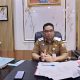 Sekda Kotabaru Eka Saprudin di ruang kerja saat menyampaikan apresiasi peran media sebagai mitra pemerintah daerah.