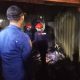 Petugas Damkar memeriksa bagian dalam rumah warga yang hangus terbakar akibat dugaan korsleting listrik di Desa Bandengan, Cirebon.