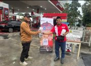 Pembagian takjil gratis oleh Pertamina Retail di SPBU COCO dalam program MyPertamina Berbagi Ramadan 2026.