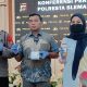 Petugas Polresta Sleman memperlihatkan barang bukti bubuk petasan dan alat peracik dalam konferensi pers kasus petasan di Gamping.