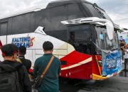 Bus program mudik gratis Kalteng 2026 di Palangka Raya yang mengangkut ratusan pemudik menuju berbagai wilayah.