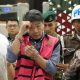 Kejagung menggiring Samin Tan sebagai tersangka kasus tambang ilegal PT AKT di Kalimantan Tengah.