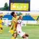 Pemain Barito Putera duel udara dengan pemain Deltras FC pada pertandingan Championship 2025/2026 di Stadion Gelora Delta Sidoarjo.