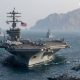 Kapal induk AS USS Abraham Lincoln berlayar di laut bersama kapal pengawal, sumber foto media sosial.