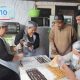 Peserta UMKM perempuan memproduksi kue dan makanan olahan saat mengikuti program PFpreneur 2026 dari Pertamina Foundation.