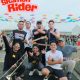 Personel band Skamen Rider berpose di Batfest Batulicin dengan latar festival musik ska dan penonton