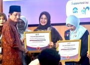 DWP Kemenag Kalsel menerima penghargaan nasional pelapor e-reporting terlengkap di Jakarta