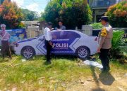 pemasangan replika mobil patroli polisi di tikungan rawan kecelakaan kintap tanah laut