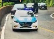 Mobil berhenti di tikungan tajam jalur Sitinjau Lauik Sumatera Barat dalam video viral di media sosial.