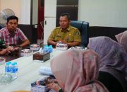 Pejabat Pemkab Tanah Laut mengikuti rakor pengendalian inflasi dan sosialisasi program nasional di ruang rapat Pelaihari.