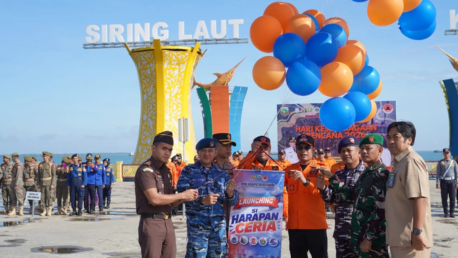 Peluncuran aplikasi Si Harapan Ceria dalam Apel Hari Kesiapsiagaan Bencana 2026 di Siring Laut Kotabaru.